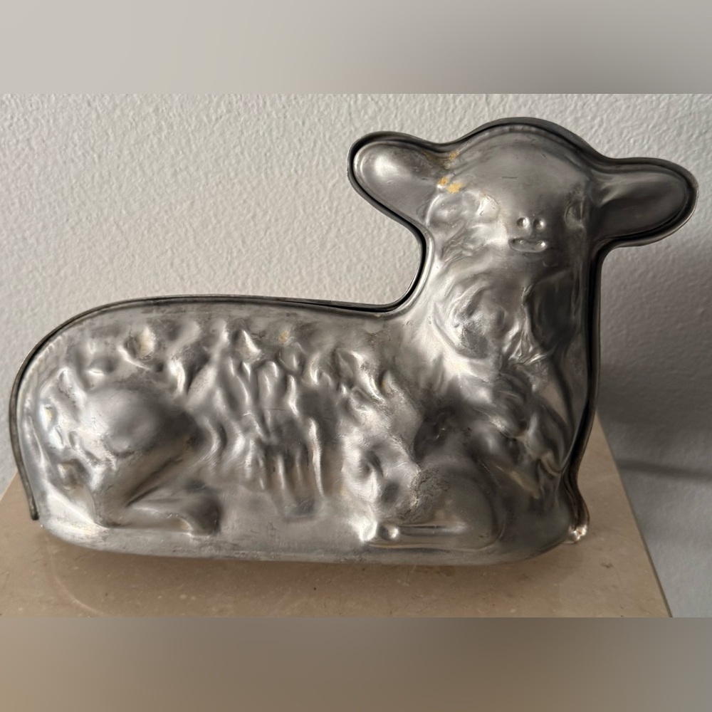 vintage, two-piece cast aluminum lamb cake mold.